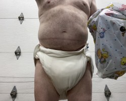 Baby in morning soaked cloth diapers