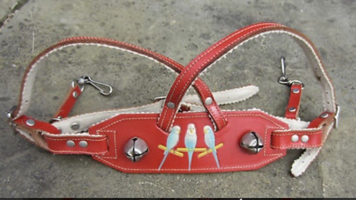 <p>Vintage jingle bell pram reins</p>
