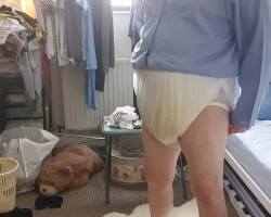 Wet terry nappy under plastic pants