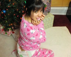 Added today: Ally in her Chsitmas PJ's and diaper.https://diaper.pics#adultbaby #abdl #diaper #diapers