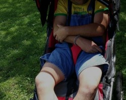 Being pushed in the stroller at a park