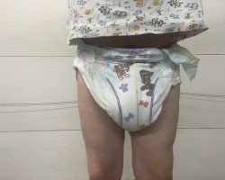 Baby in huggies baby diapers on little kings adult diapers