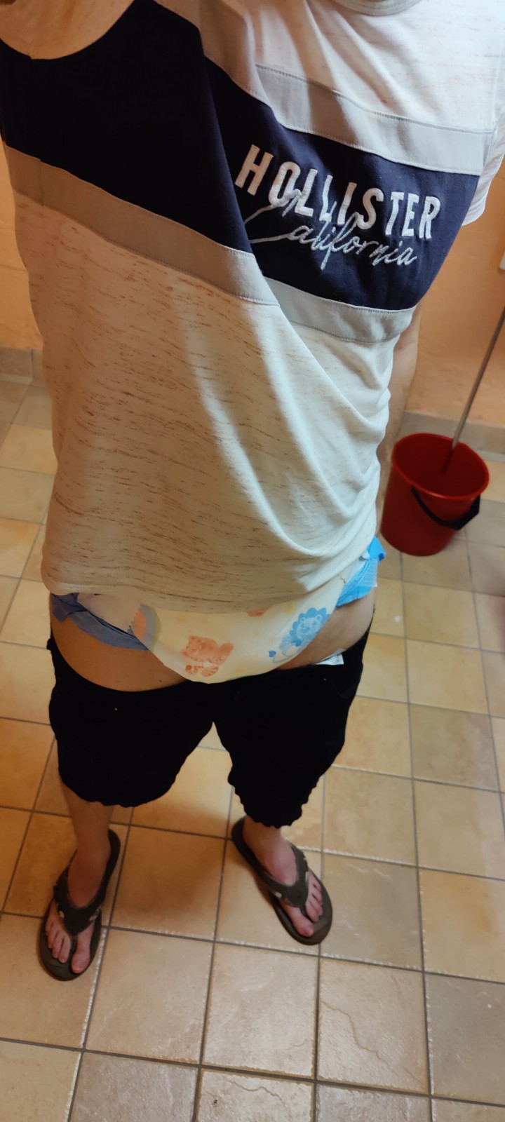 <p>Always fun to be diapered when doing the laundry in the apartments communal laundry room</p>