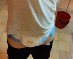 Always fun to be diapered when doing the laundry in the apartments communal laundry room