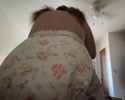I'm boosted, powdered, padded and pigtails in my newest print diaper. It's wonderful to be a little gurl.