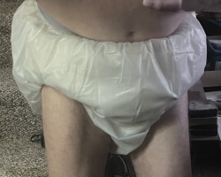 Blue pants over cloth diapers