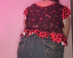 When wearing a skirt with ruffle butt onsies, at least one row of ruffles has to show.  This is how I was dressed when the pizza guy delivered last night.