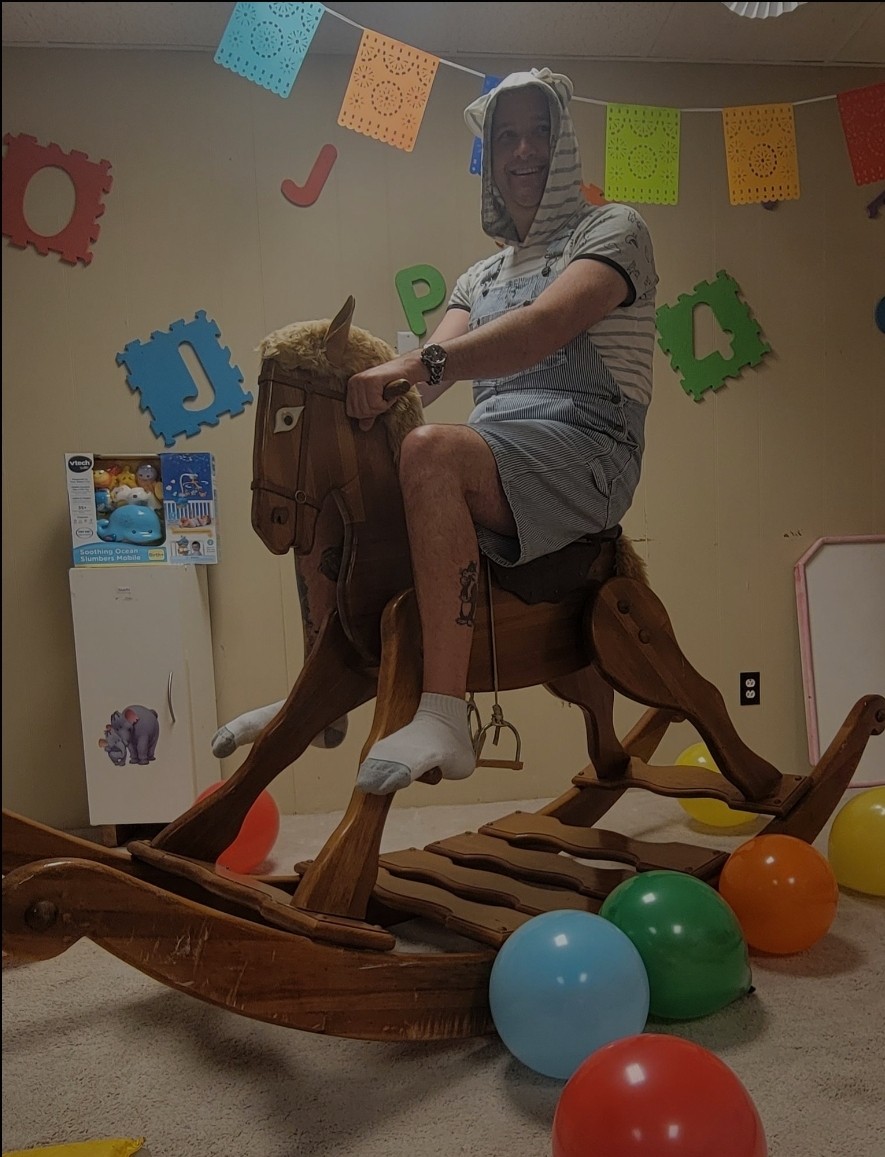 <p>Rocking on the rocking horse.</p>