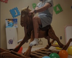 Rocking on the rocking horse.