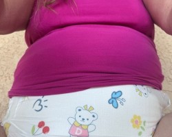 Nothing here but a little gurl enjoying the morning her patio wearing a diaper and cami-top